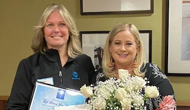Image of Kerri Countess receiving Fiat Lux Award from Shawna Laxague