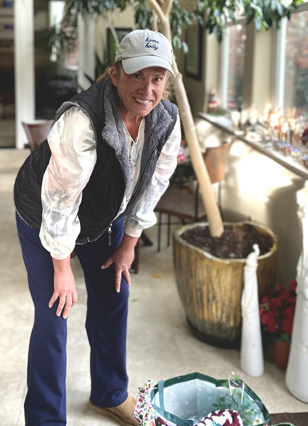 image of Lisa Lambrix working on bags