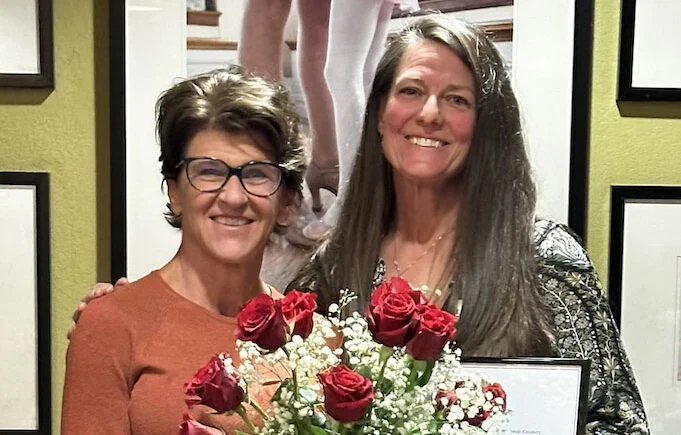 Image of Staci Alonso receiving Ruby Award from Jen Masterson